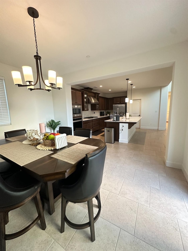 dining area with a chandelier