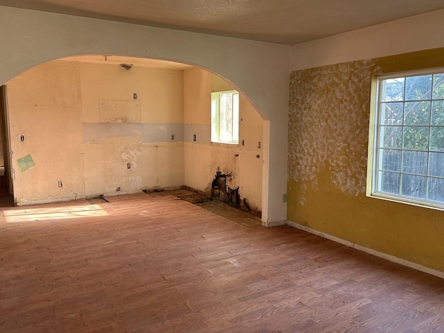 empty room featuring hardwood / wood-style flooring