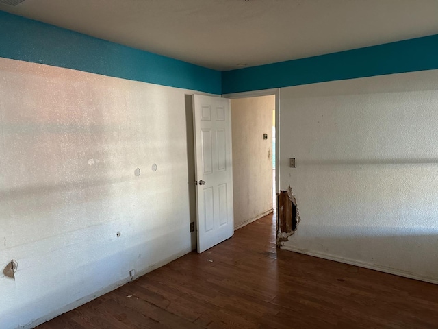 interior space with dark hardwood / wood-style flooring