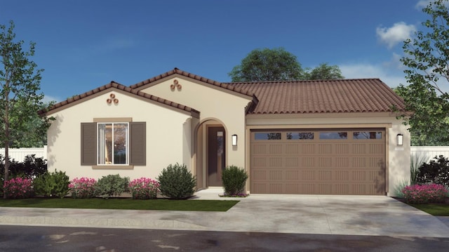 mediterranean / spanish home featuring a garage