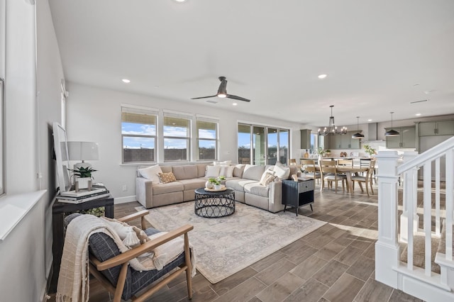 946 Talus Way S, Madera, CA 93636 - living room with ceiling fan, a chandelier, recessed lighting, and dark wood-type flooring