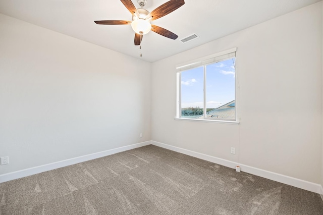 unfurnished room with carpet flooring and ceiling fan