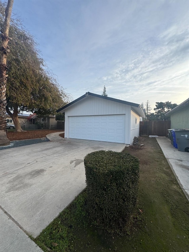 view of property exterior featuring a garage