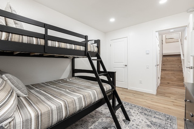 bedroom featuring hardwood / wood-style flooring