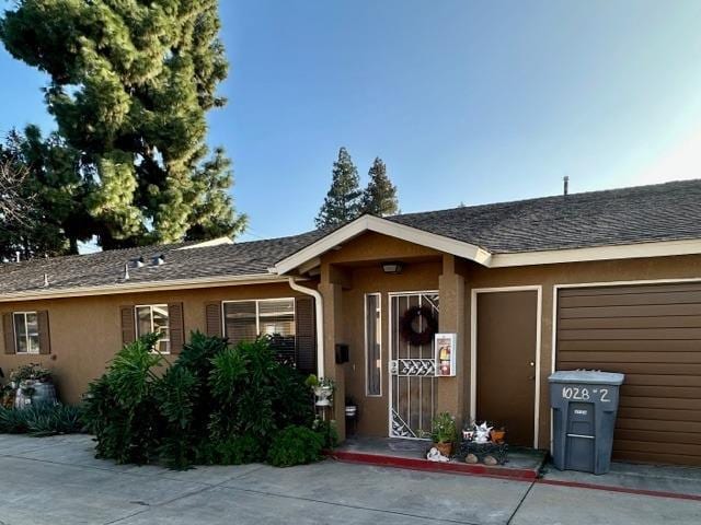 ranch-style house featuring a garage