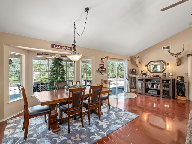 28899 Limestone Way, Coarsegold, CA 93614 - dining space with vaulted ceiling, wood finished floors, baseboards, and ceiling fan