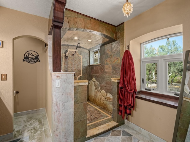 28899 Limestone Way, Coarsegold, CA 93614 - bathroom featuring tiled shower and baseboards
