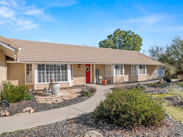 28899 Limestone Way, Coarsegold, CA 93614 - single story home featuring covered porch and a tiled roof