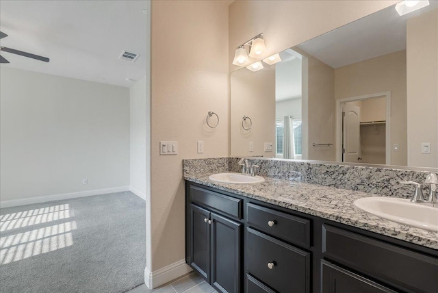 bathroom with vanity and ceiling fan