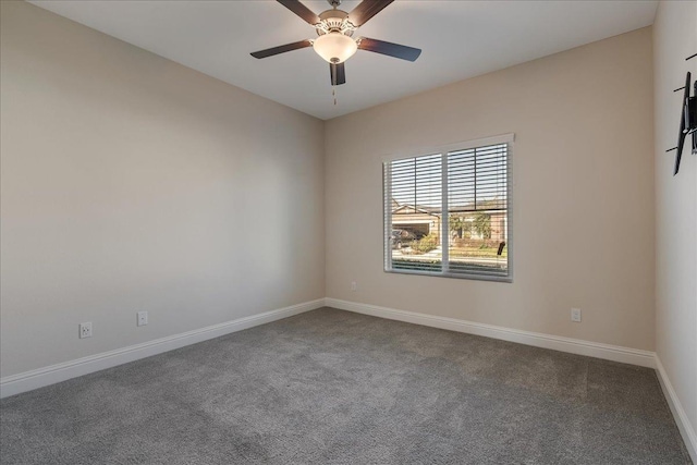 unfurnished room with carpet flooring and ceiling fan