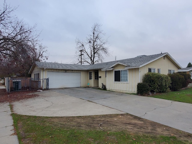 ranch-style house featuring a garage