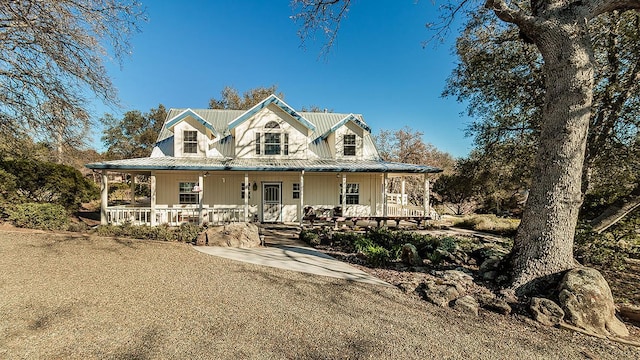 farmhouse featuring a porch