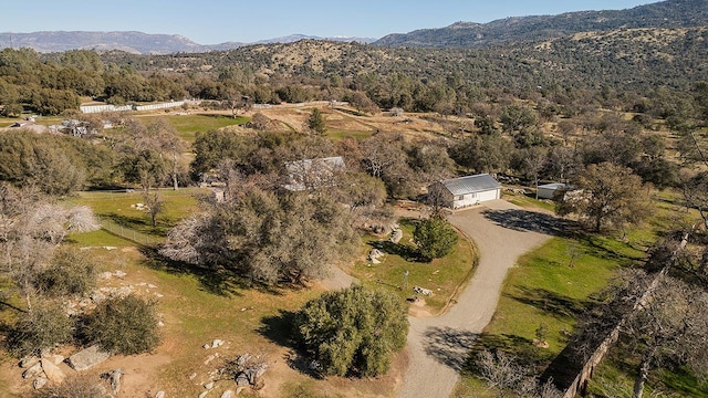 drone / aerial view featuring a mountain view