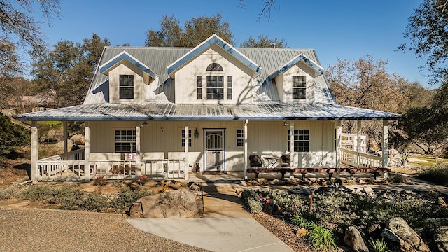 farmhouse inspired home featuring a porch