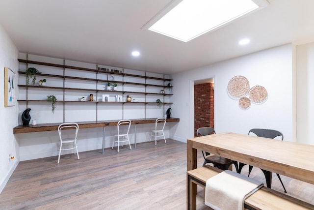 dining area featuring hardwood / wood-style flooring