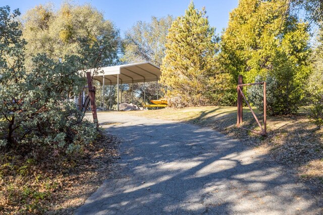 view of road with driveway