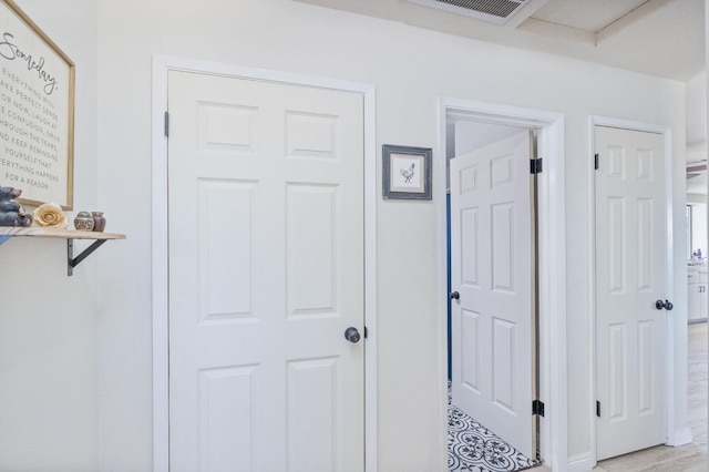 hallway with visible vents