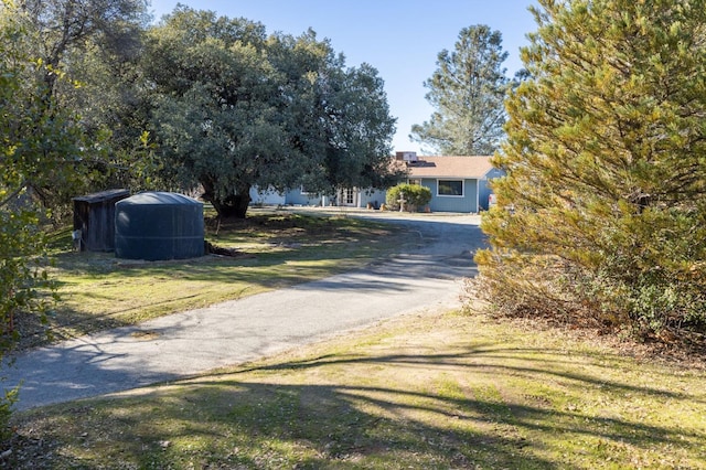 view of street featuring driveway