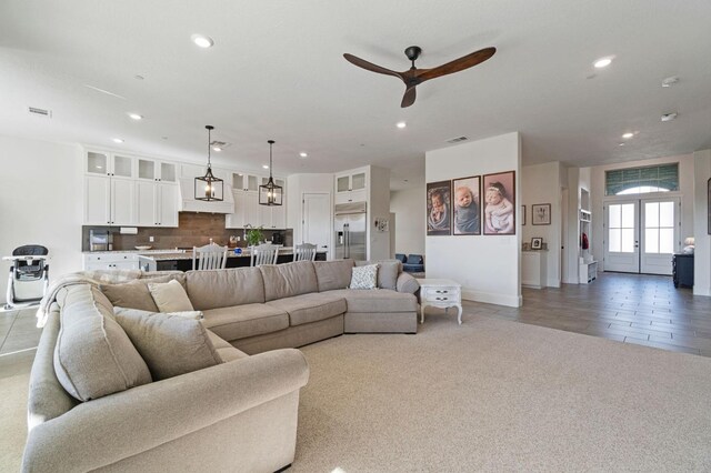 living room with ceiling fan