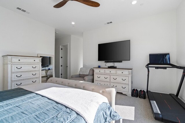 bedroom featuring light carpet and ceiling fan