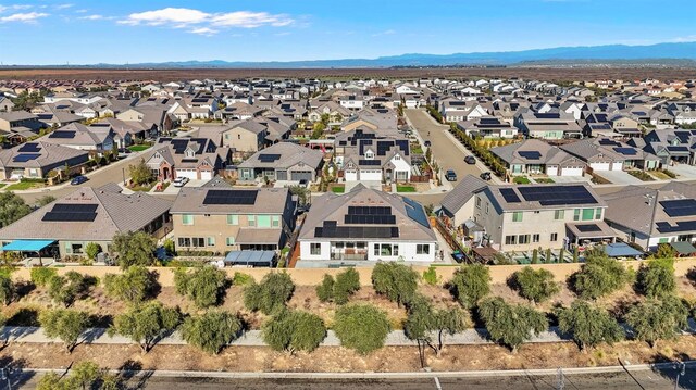 drone / aerial view featuring a mountain view