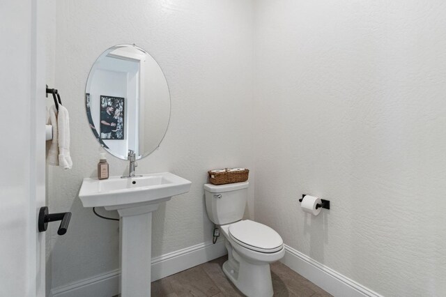 bathroom featuring toilet