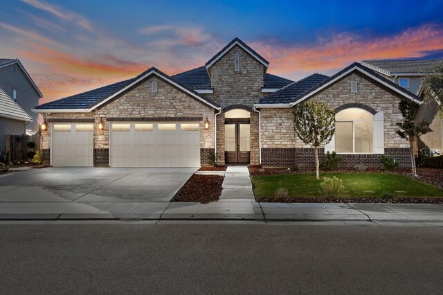 view of front of home with a garage