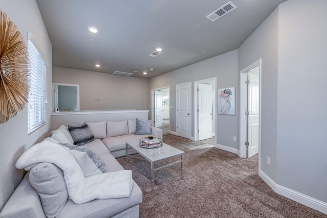 living room featuring carpet