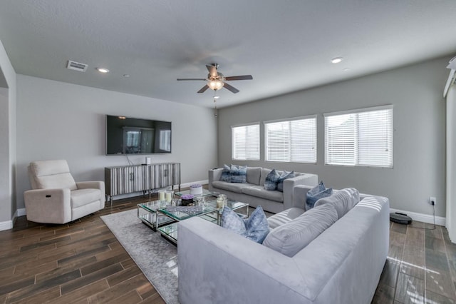 living room featuring ceiling fan