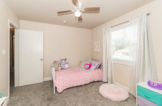 bedroom featuring ceiling fan and carpet flooring