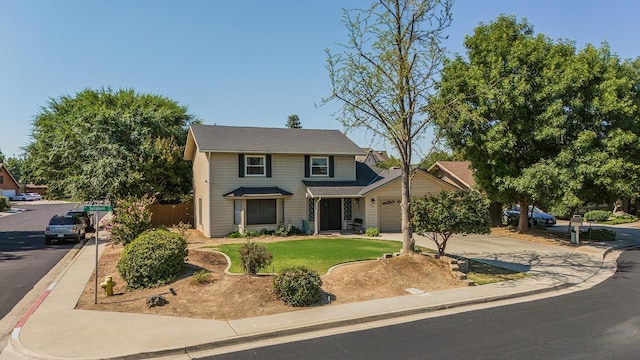 view of front of property with a garage