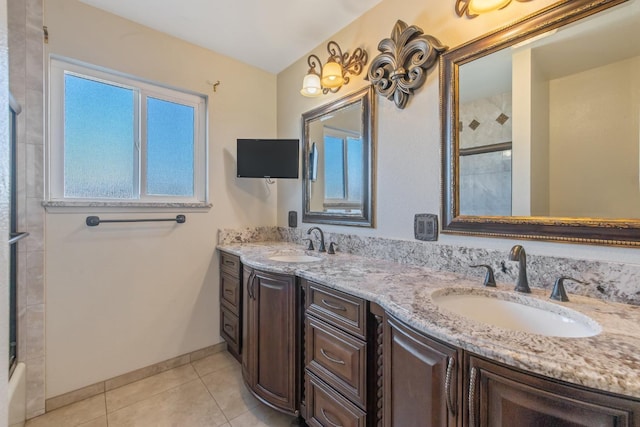 bathroom featuring tile patterned flooring, vanity, and shower / bath combination