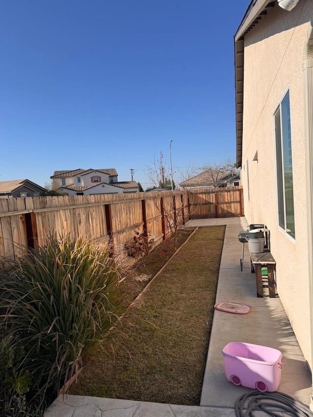 view of yard with a patio area