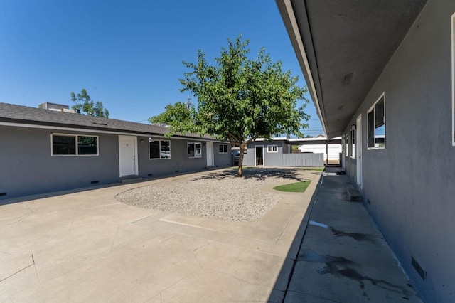 view of patio / terrace featuring an outbuilding