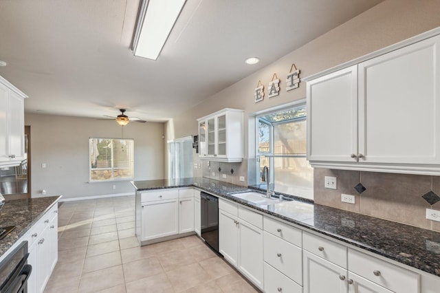 kitchen featuring sink, white cabinetry, ceiling fan, kitchen peninsula, and black appliances