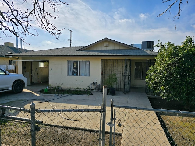 view of front of home with central AC unit