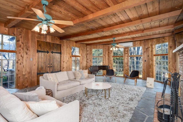 living room featuring wood walls, wood ceiling, beam ceiling, ceiling fan, and a wall mounted air conditioner