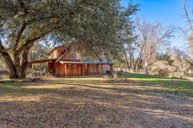 exterior space with a front yard