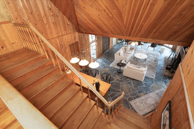 interior space featuring wood ceiling and an inviting chandelier