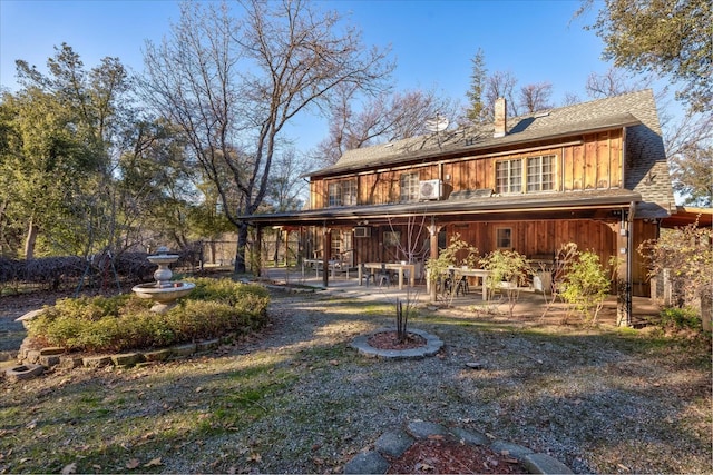 back of house featuring a patio