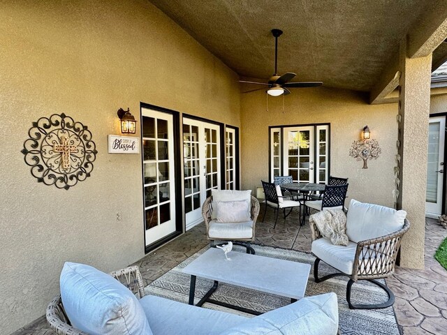 view of patio with ceiling fan and french doors