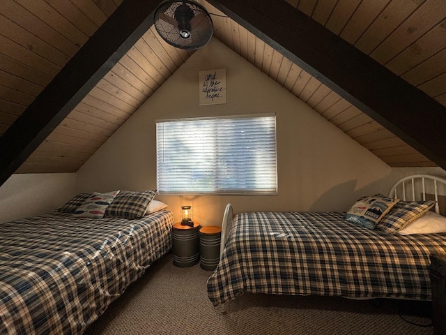 bedroom featuring vaulted ceiling with beams