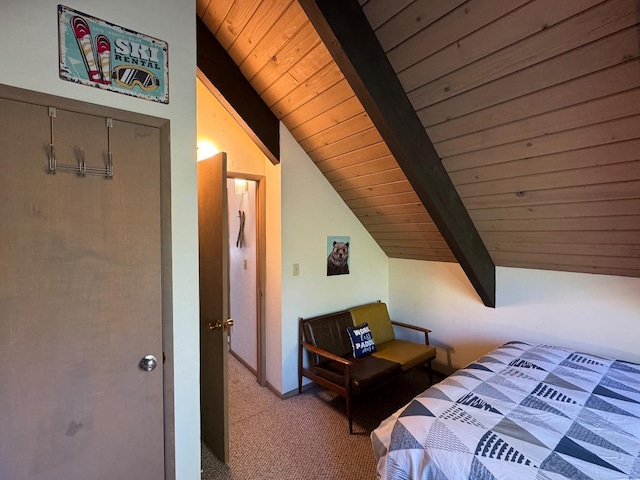 bedroom with lofted ceiling with beams, wooden ceiling, and carpet