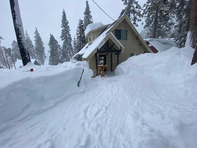 view of snow covered property