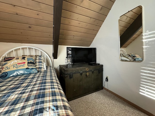 carpeted bedroom featuring wood ceiling, lofted ceiling with beams, and baseboards