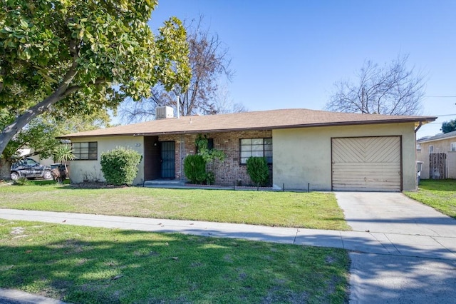 ranch-style house with a front lawn and a garage