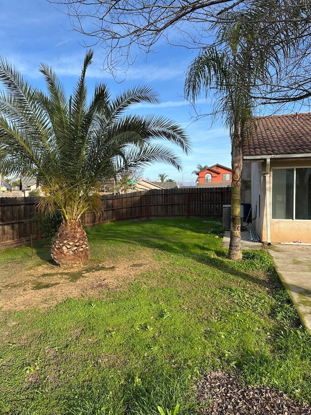 view of yard featuring central AC unit