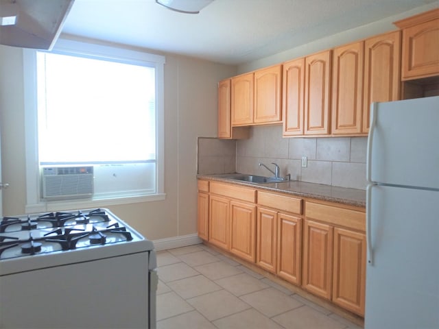 kitchen with sink, white appliances, light tile patterned flooring, decorative backsplash, and a wall mounted AC