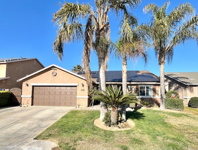 view of front facade featuring solar panels, a garage, and a front yard