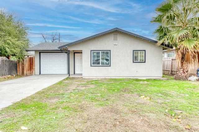 ranch-style home featuring a front yard and a garage